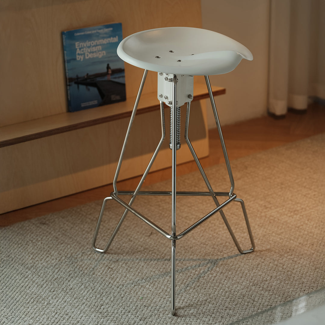 Industrial steel height adjustable bar chair spool in close up details.