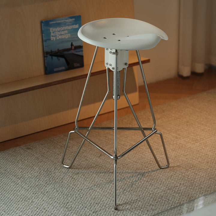 Industrial steel height adjustable bar chair spool in close up details.