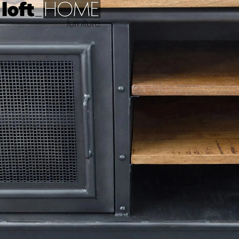 Industrial steel tv console mysteel wheel in close up details.