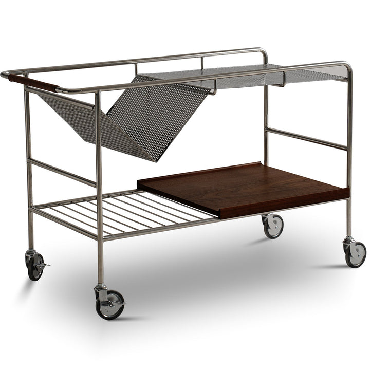 Industrial steel wheeled trolley side table manda in still life.