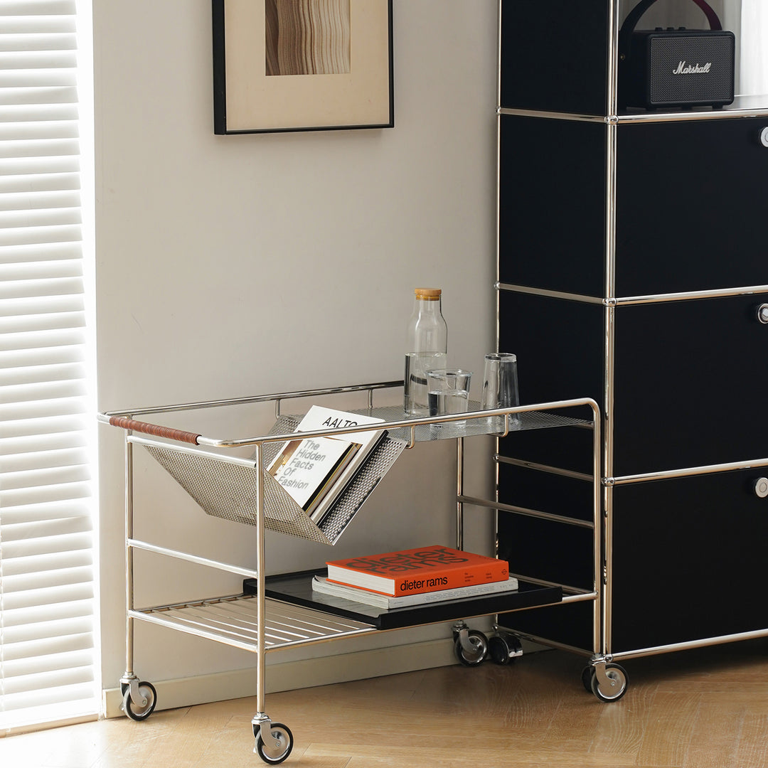 Industrial steel wheeled trolley side table manda in close up details.