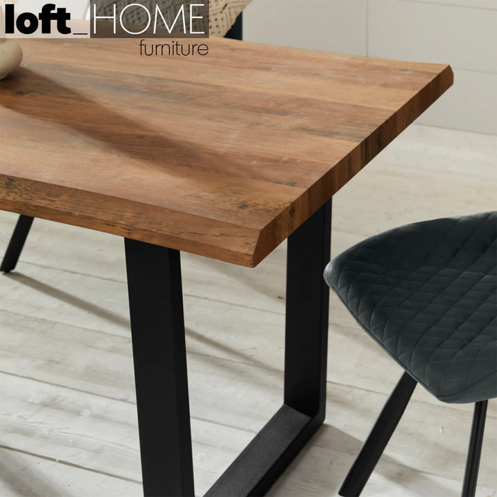 Industrial wood dining table live edge in panoramic view.