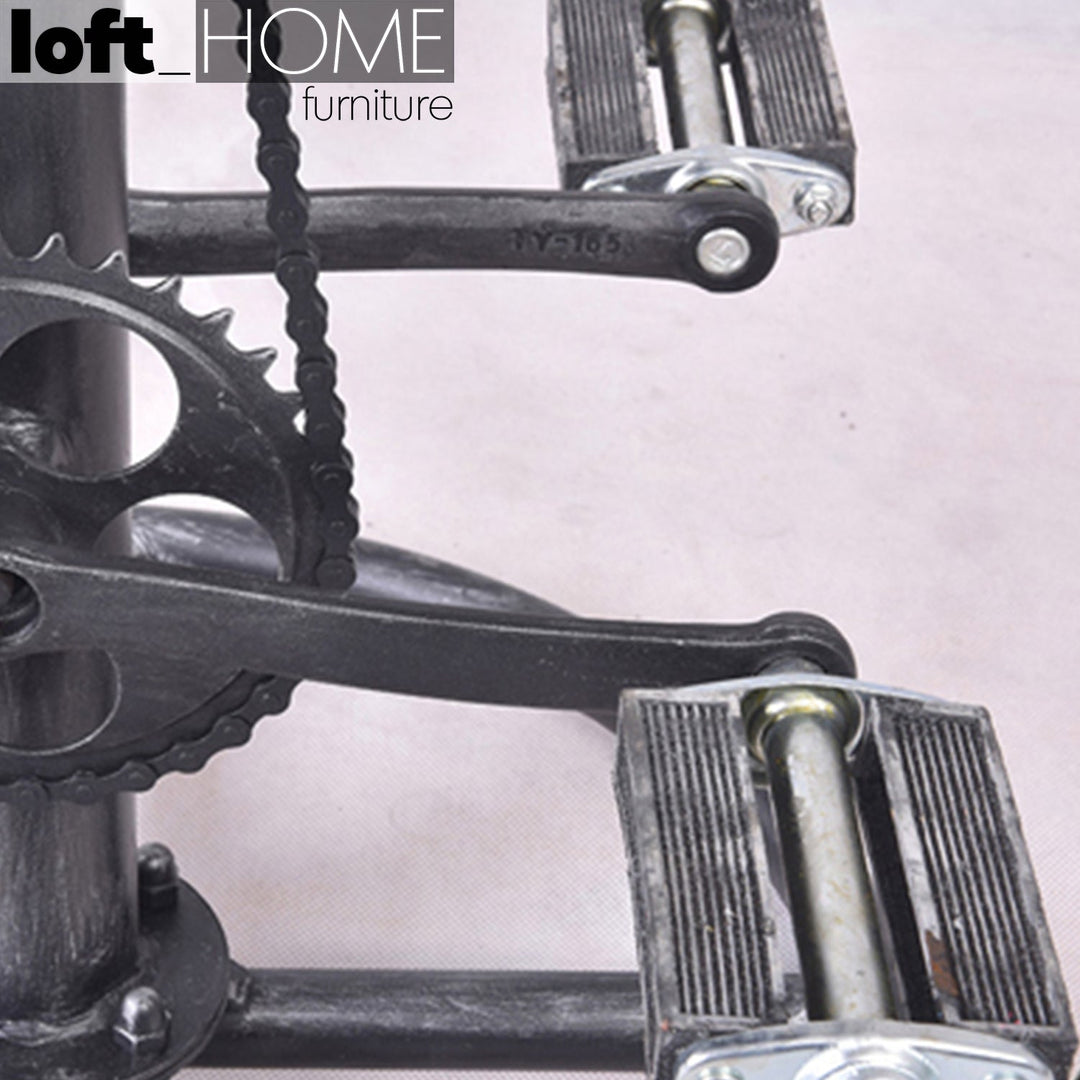 Industrial wood height adjustable bar stool bicycle in real life style.