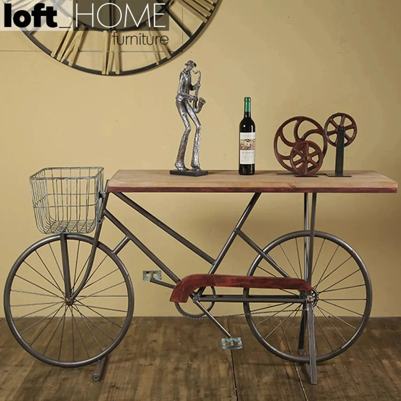Industrial wood study table bicycle in still life.