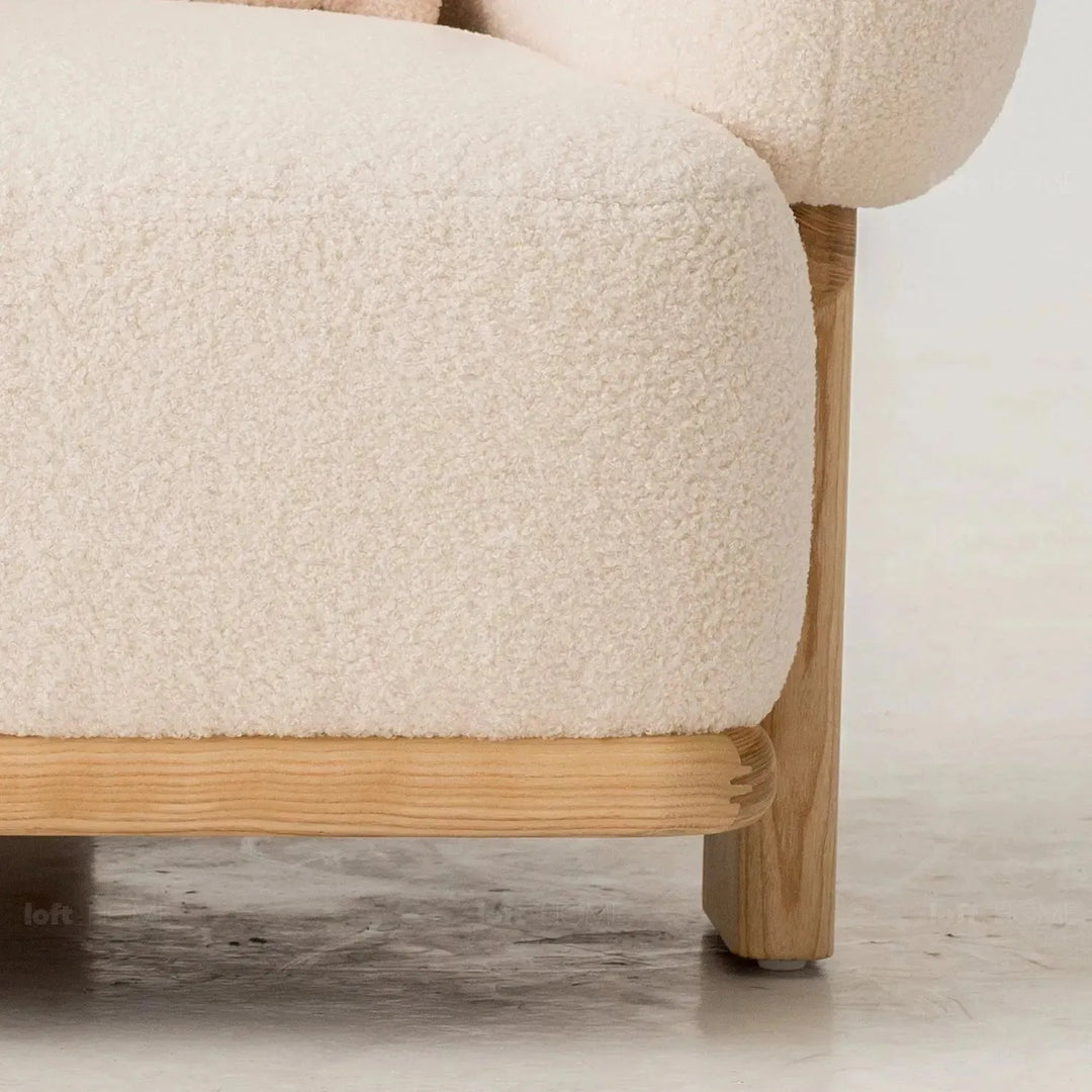 Cream boucle fabric 1 seater sofa chubby layered structure.