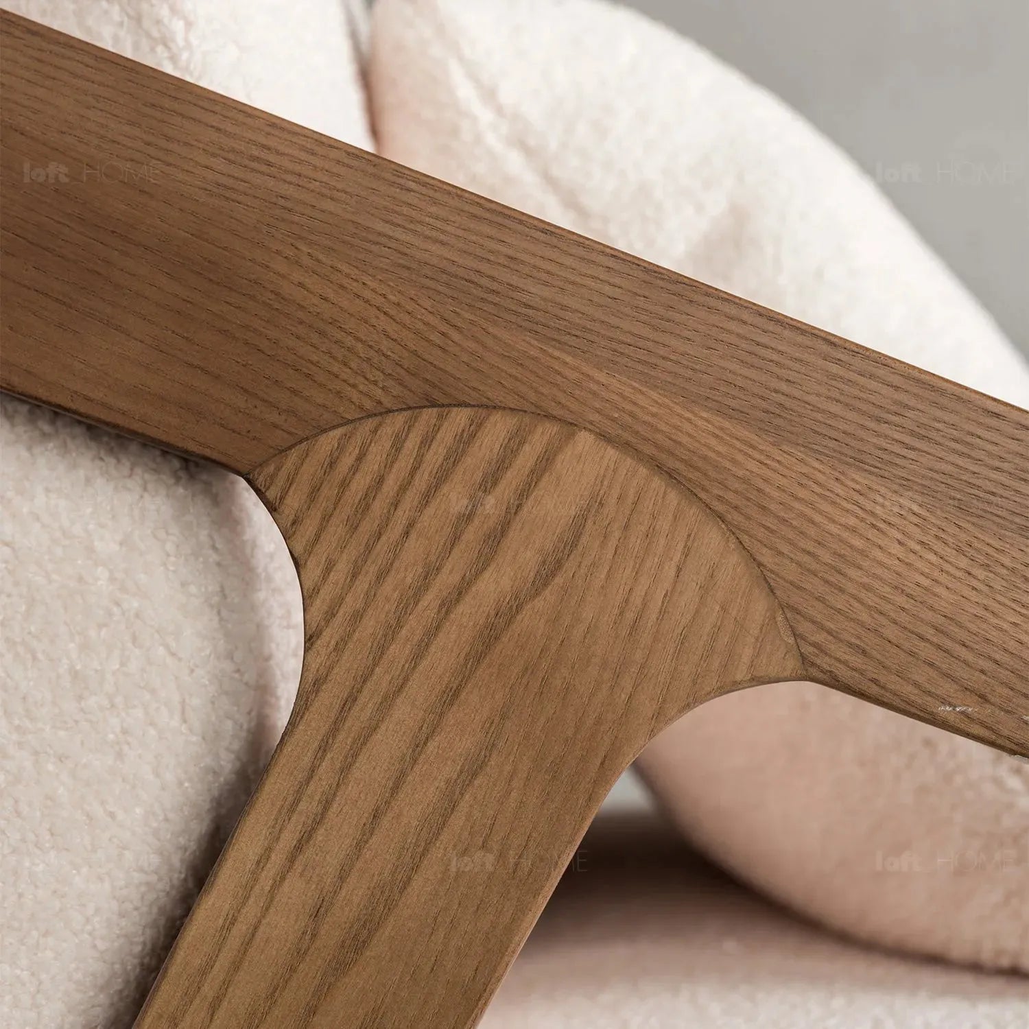 Japandi boucle fabric sofa chaise contemporaty in close up details.