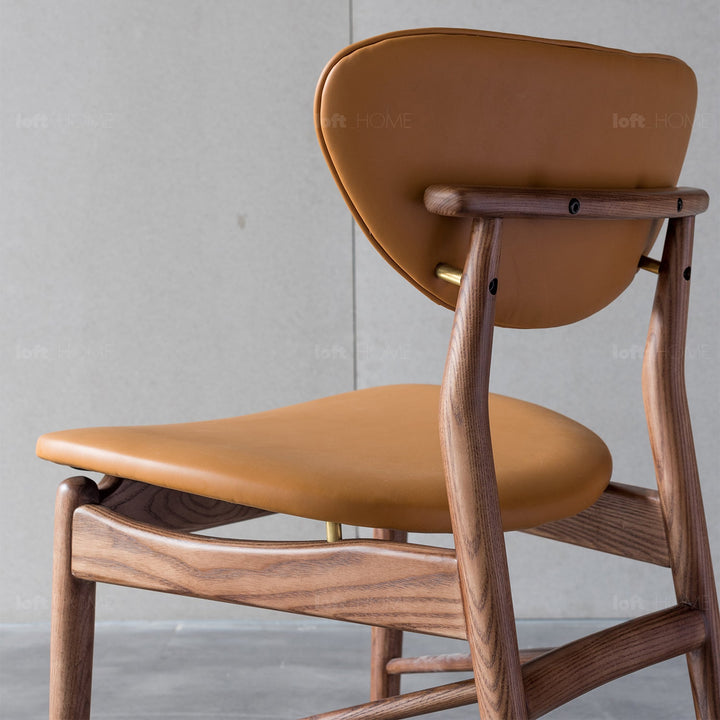 Japandi leather dining chair finn in panoramic view.