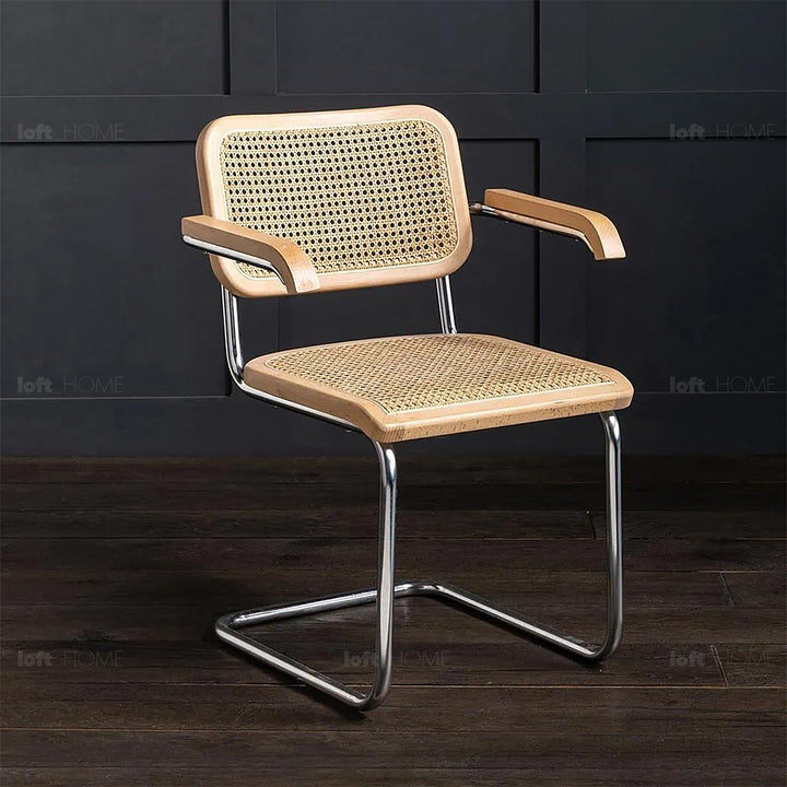 Japandi rattan armrest dining chair cesca layered structure.