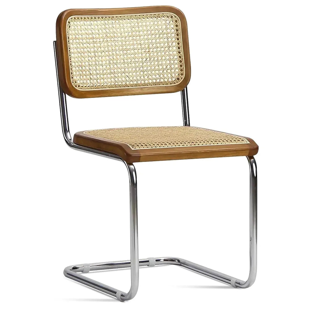 Japandi rattan dining chair cesca in white background.