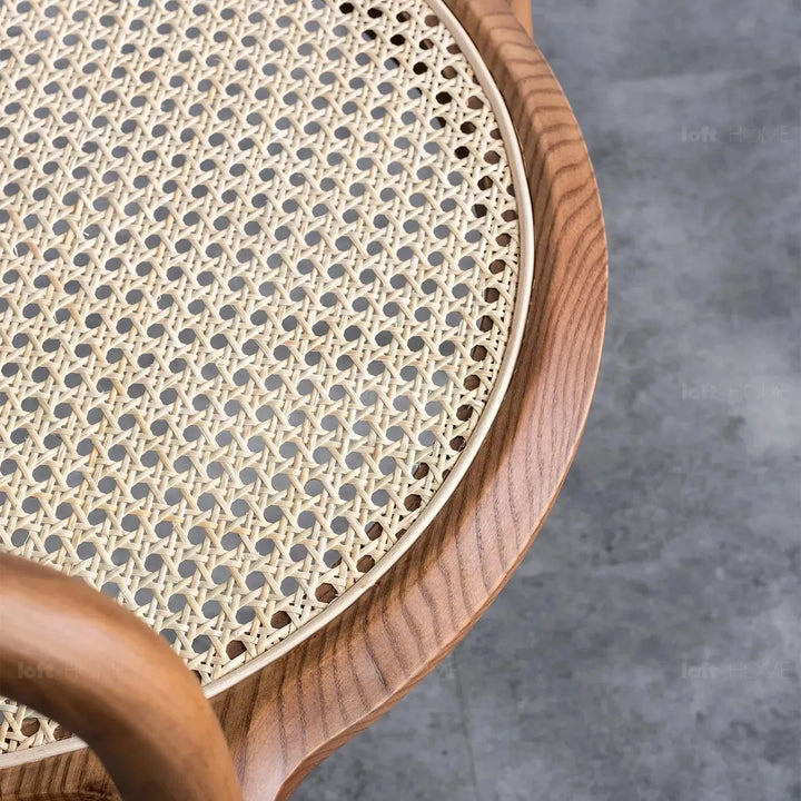 Japandi rattan dining chair circular layered structure.