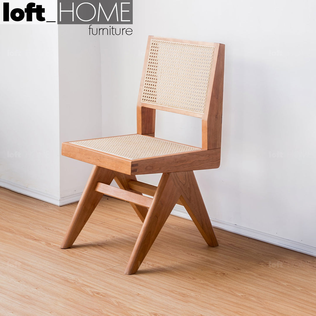 Japandi rattan dining chair jeanneret primary product view.