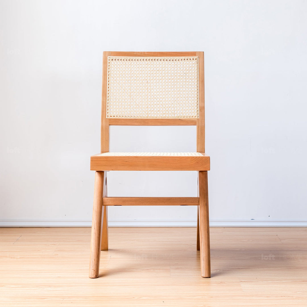 Japandi rattan dining chair jeanneret in close up details.