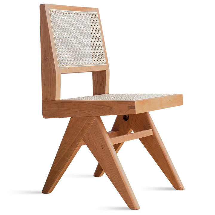 Japandi rattan dining chair jeanneret in white background.