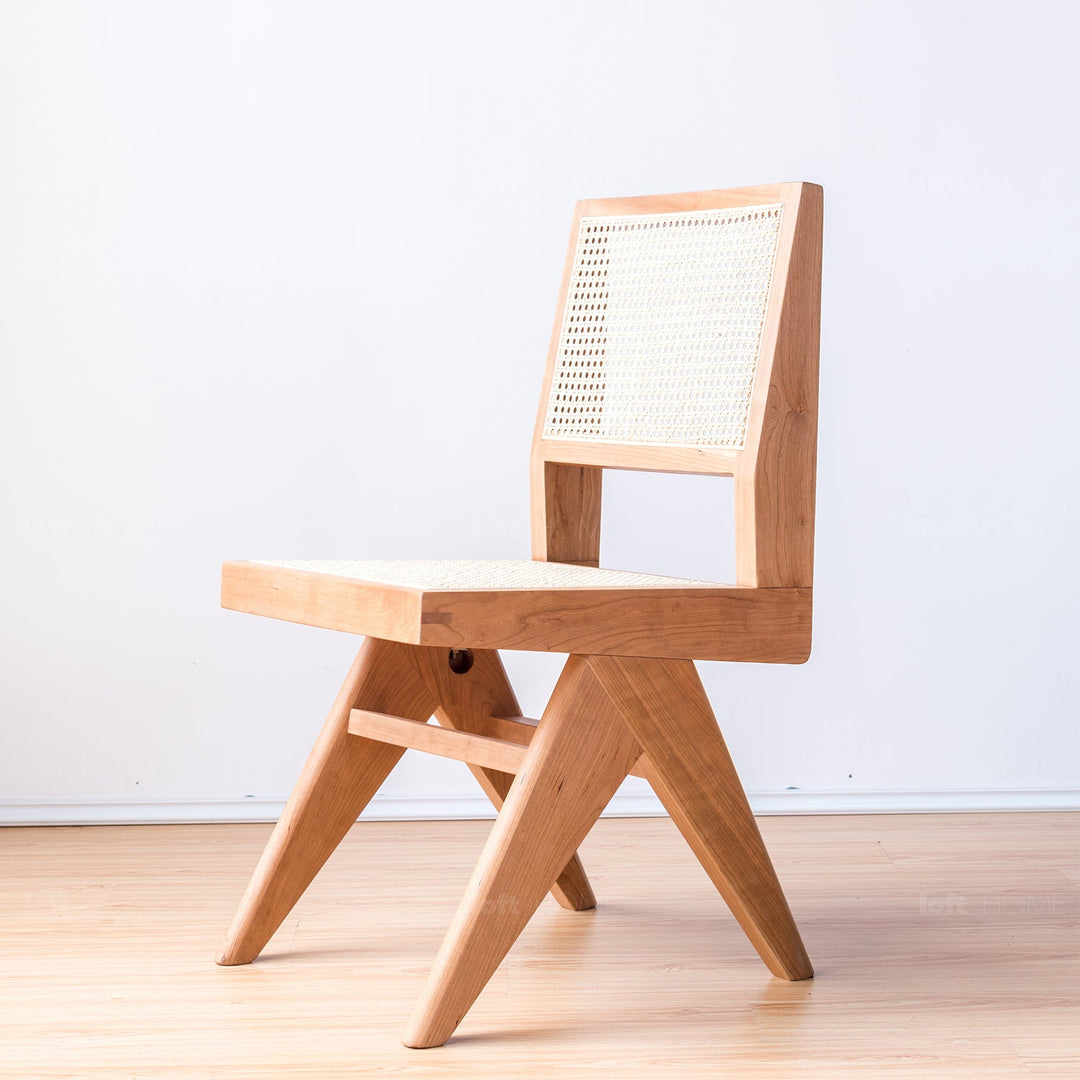 Japandi rattan dining chair jeanneret in panoramic view.