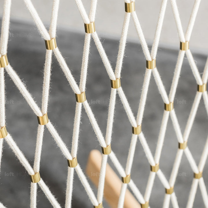 Japandi rope woven rocking chair hans wegner in close up details.