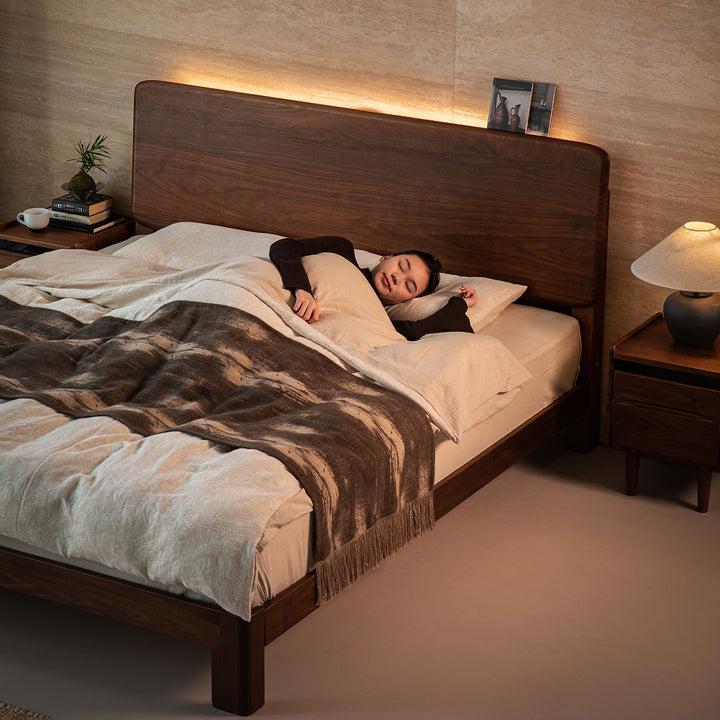 Japandi walnut wood bed dune in panoramic view.
