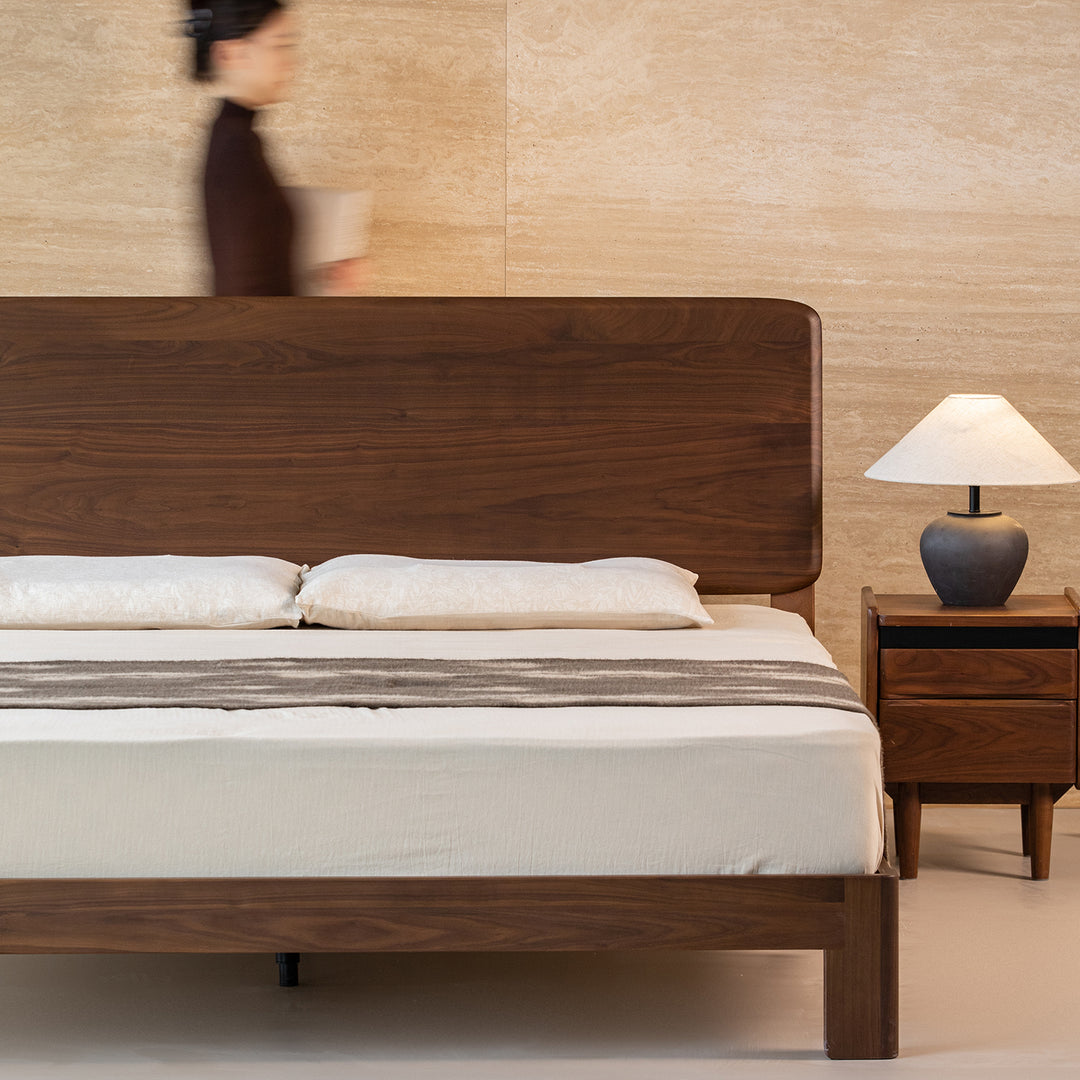 Japandi walnut wood bed dune in still life.