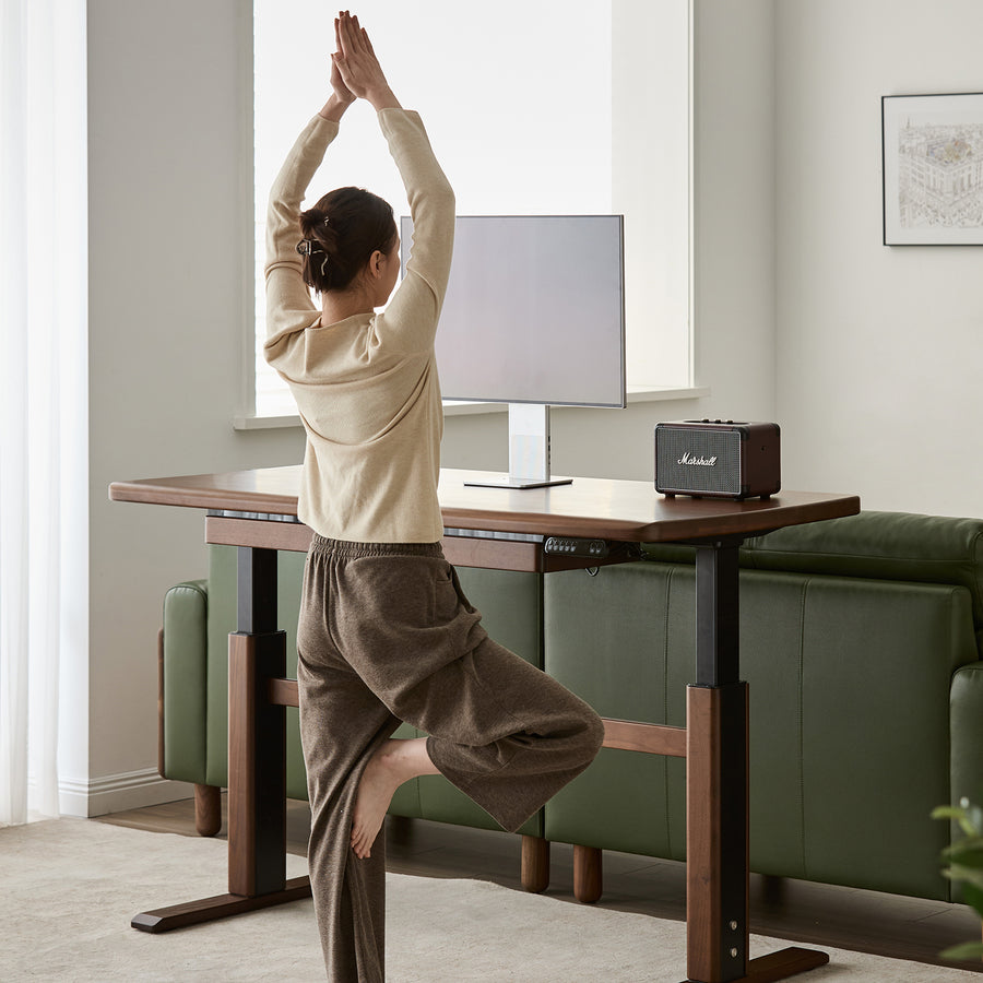 Japandi walnut wood electric height adjustable study table cloud lifting in still life.