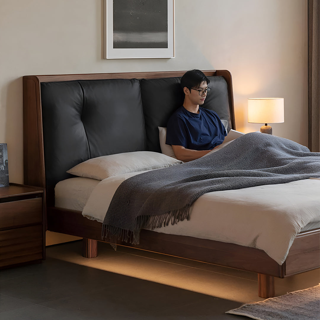 Japandi walnut wood genuine leather bed noir in still life.