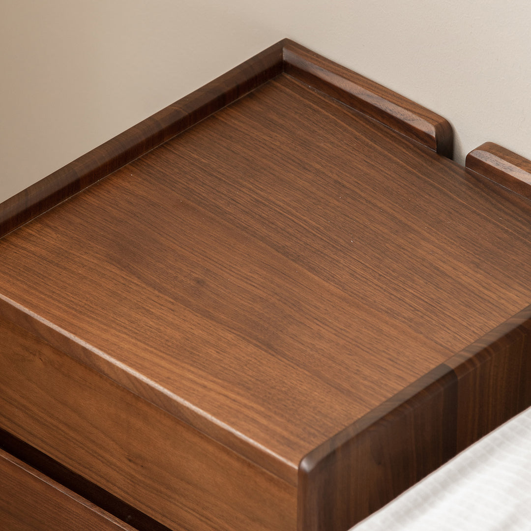 Japandi walnut wood side table vista in close up details.