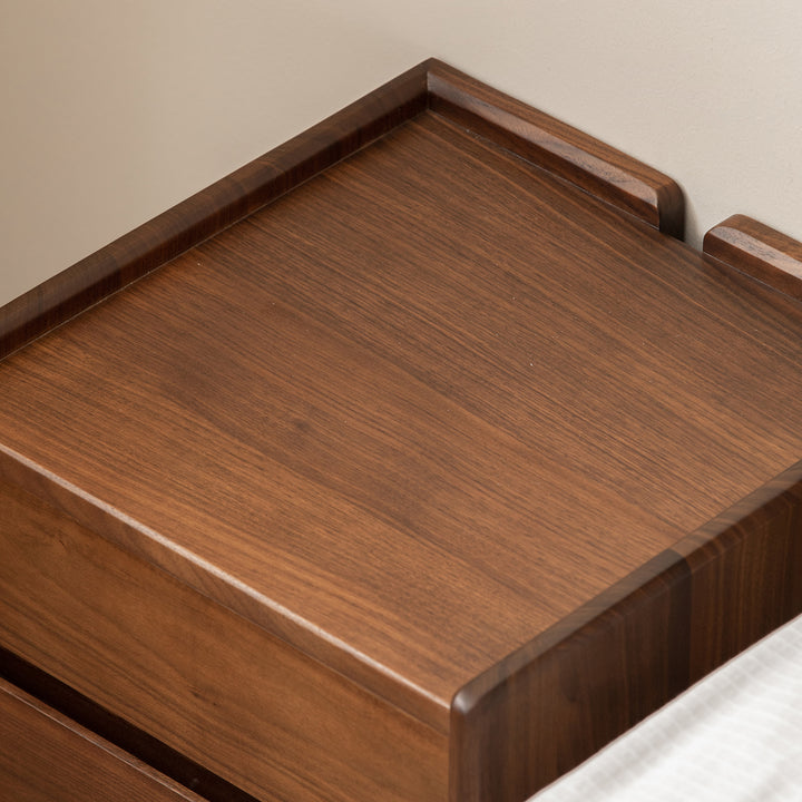 Japandi walnut wood side table vista in close up details.