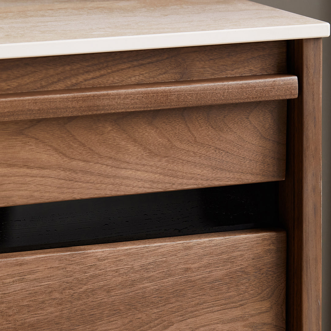 Japandi walnut wood sintered stone cabinet axis in close up details.