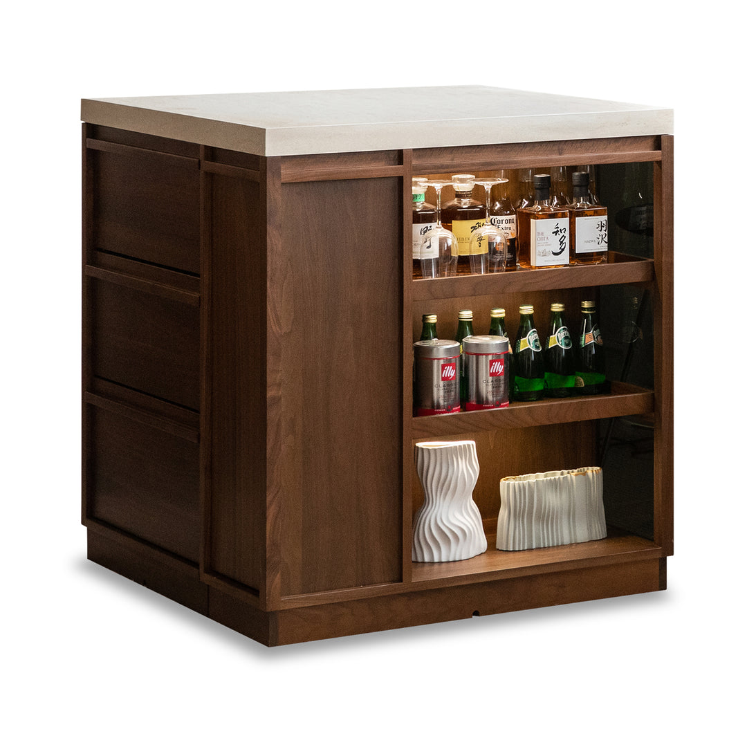 Japandi walnut wood sintered stone island dining table with cabinet axis in still life.