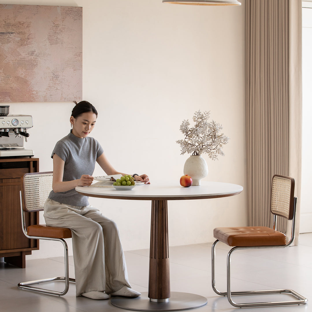 Japandi walnut wood sintered stone round dining table grey primary product view.