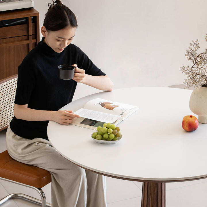 Japandi walnut wood sintered stone round dining table grey color swatches.