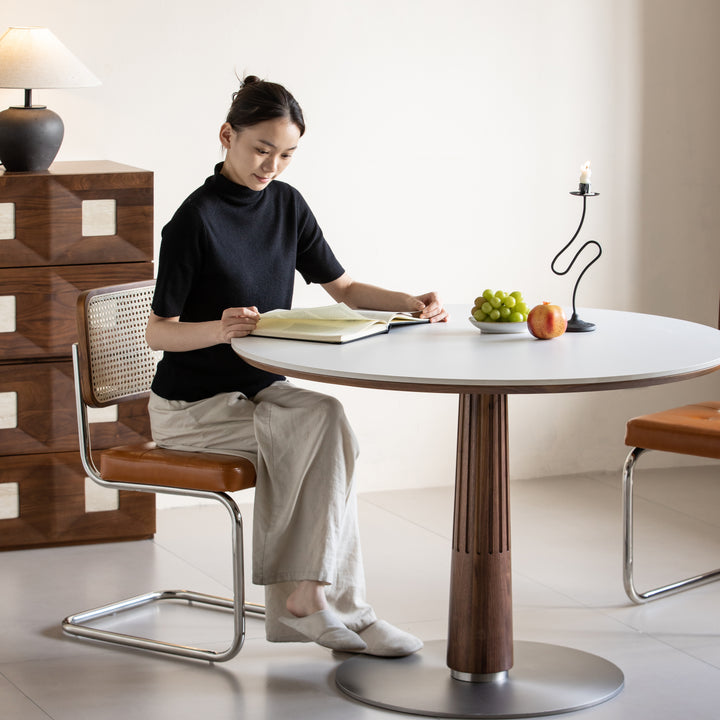 Japandi walnut wood sintered stone round dining table grey with context.
