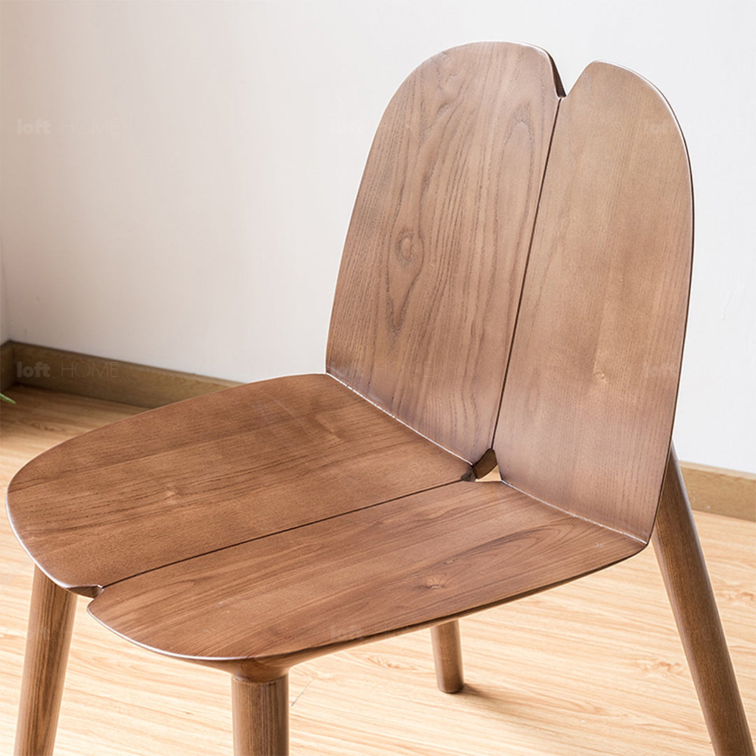 Japandi wood dining chair pulp in still life.