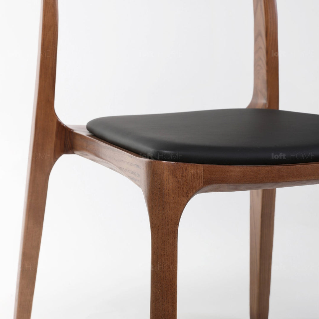 Japandi wood dining chair sleek situational feels.