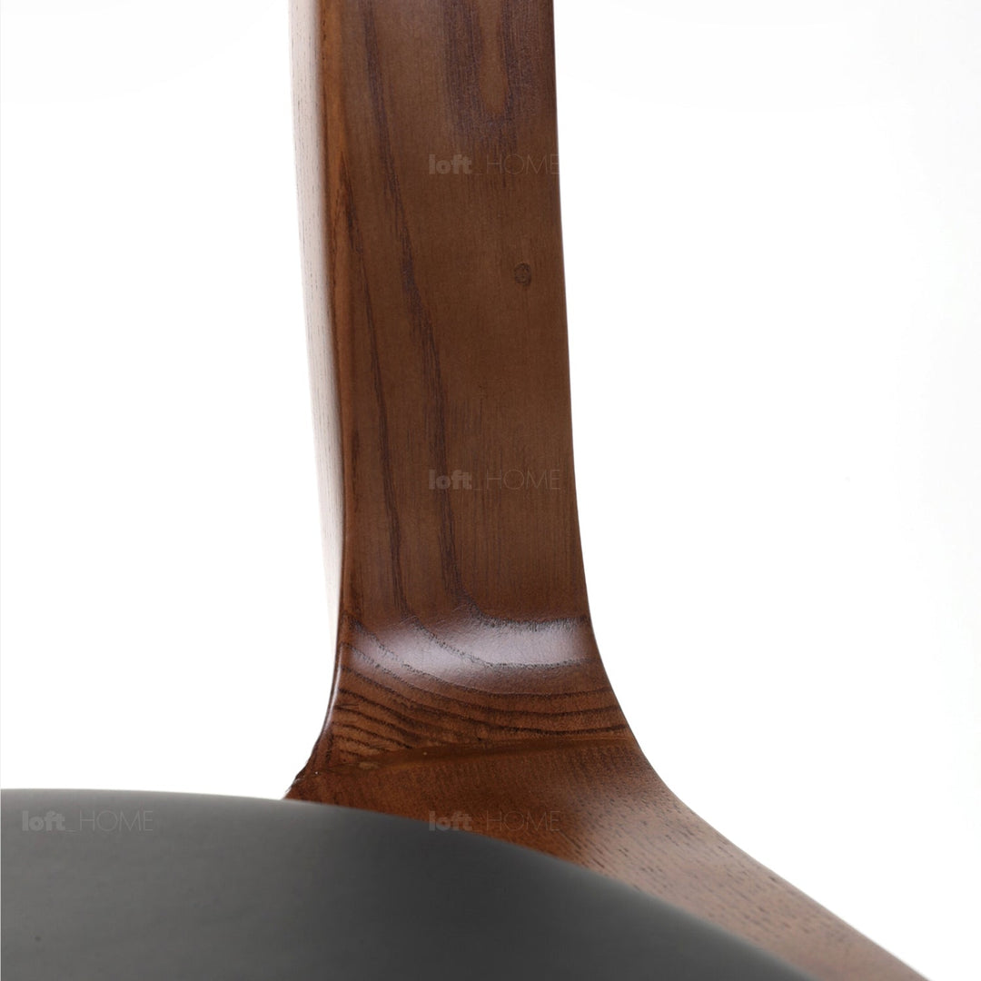 Japandi wood dining chair sleek conceptual design.