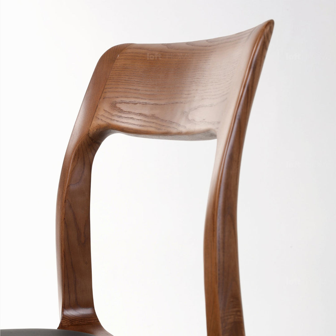 Japandi wood dining chair sleek in still life.