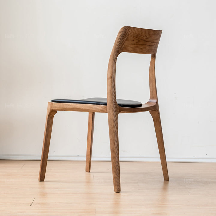 Japandi wood dining chair sleek in details.