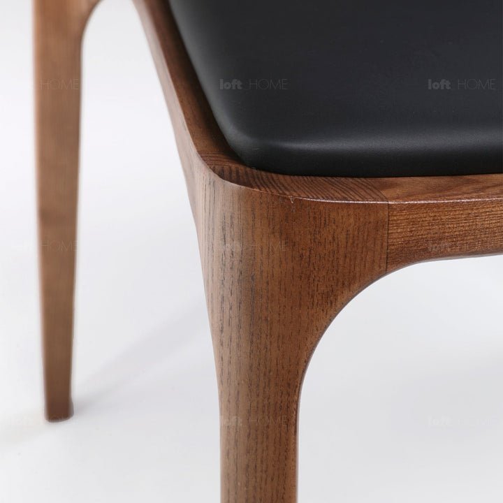 Japandi wood dining chair sleek environmental situation.