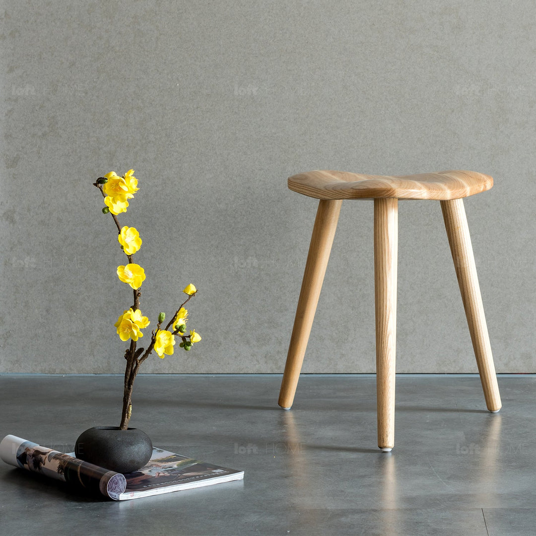 Japandi wood dining stool ride with context.