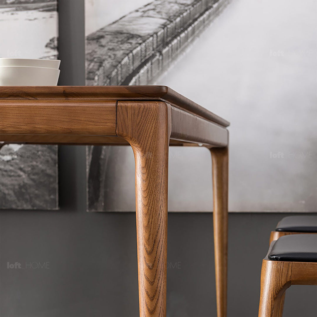Japandi wood dining table adeline in close up details.