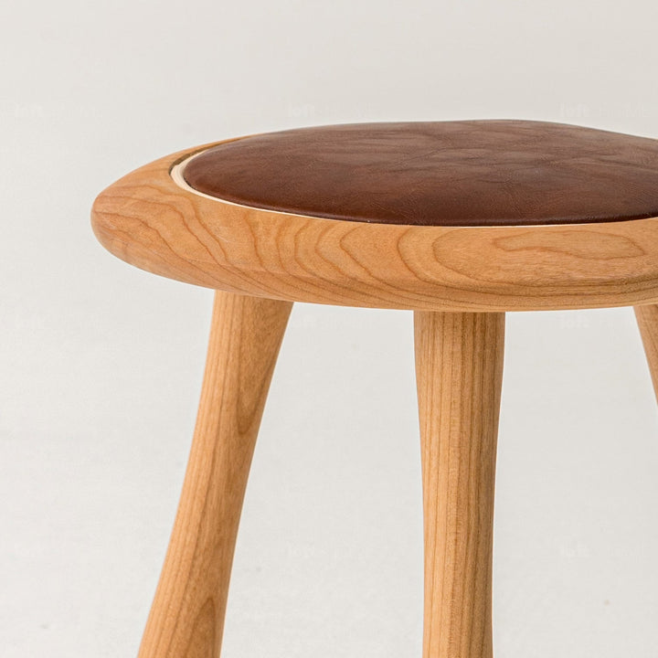 Japandi wood round stool petite in details.