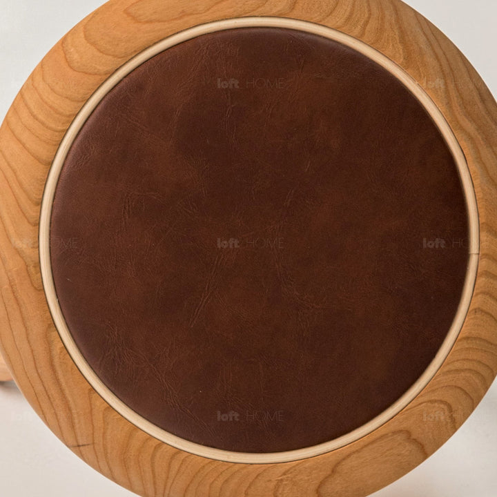 Japandi wood round stool petite in close up details.