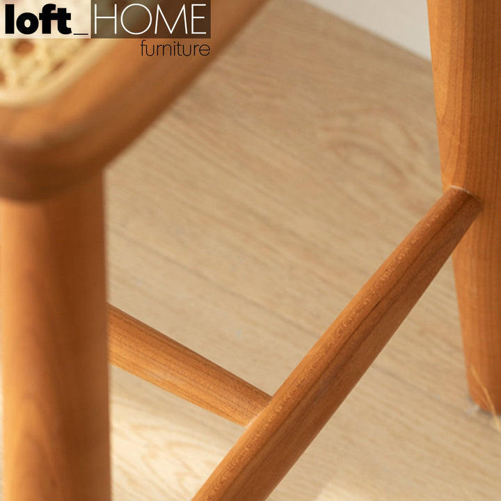 Japandi wood stool cherry rattan conceptual design.