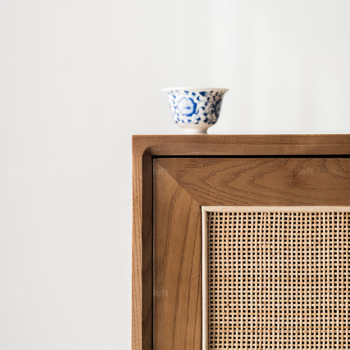 Japandi wood storage cabinet peak in panoramic view.