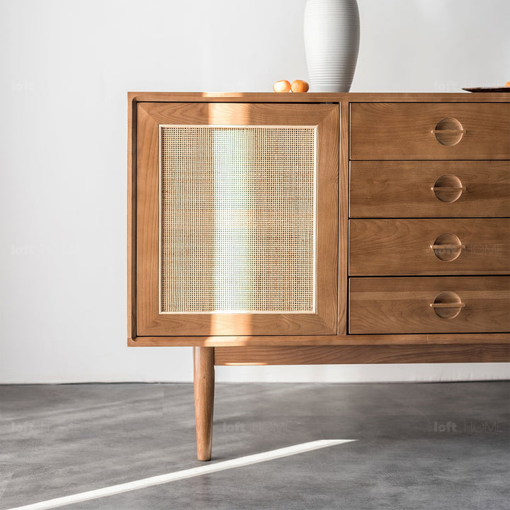 Japandi wood storage cabinet peak in still life.