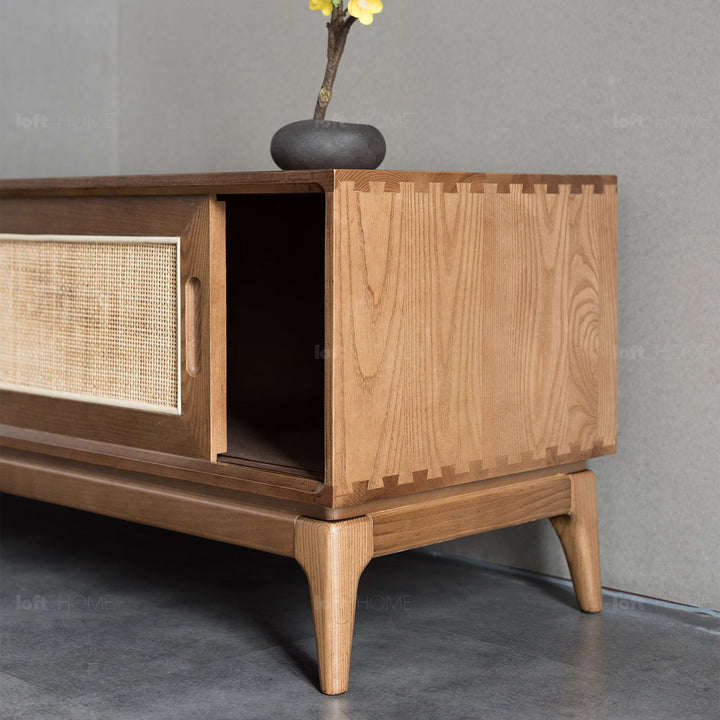 Japandi wood tv console peak in panoramic view.