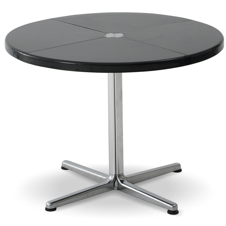 Minimalist abs steel round dining table donut in panoramic view.