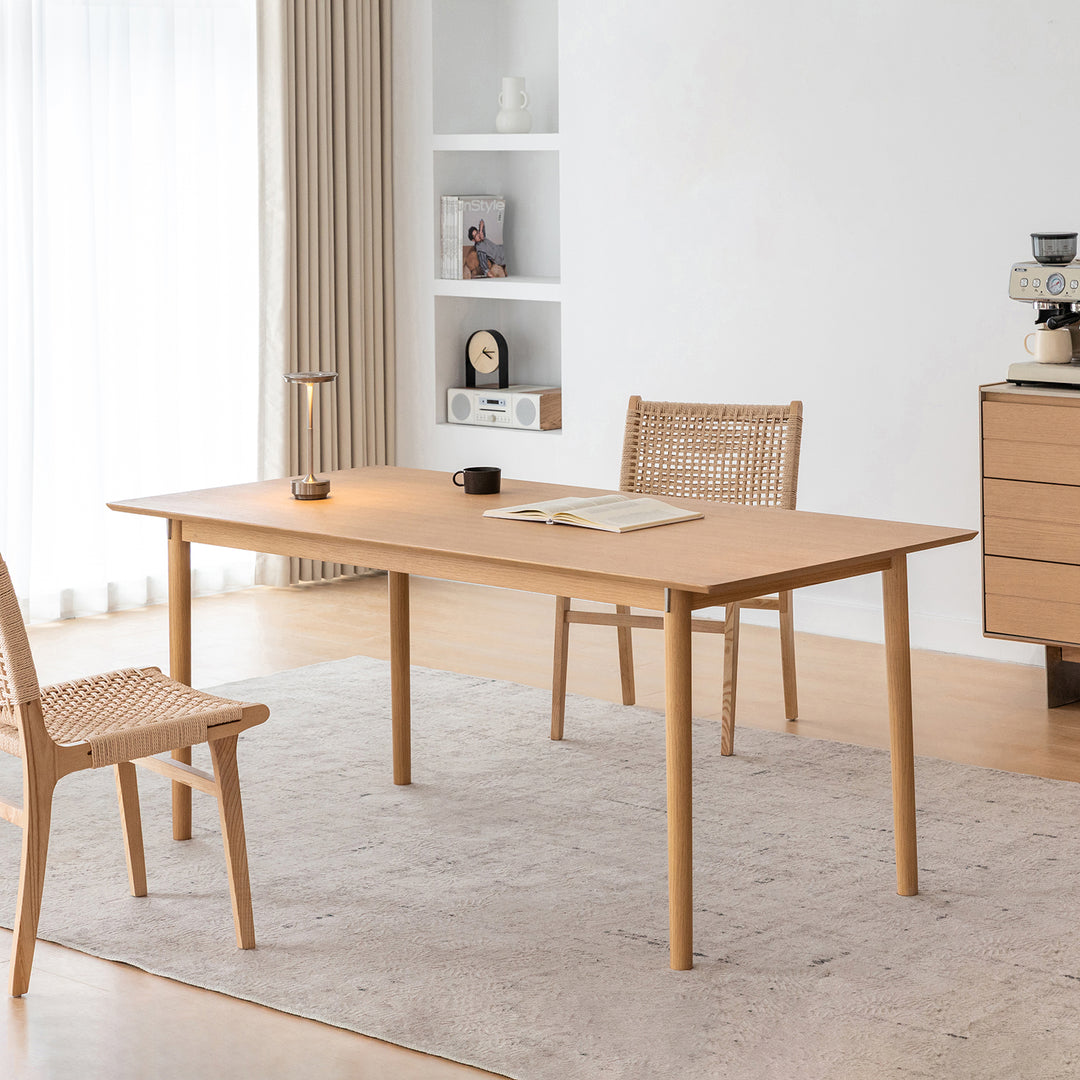 Minimalist ash wood dining table borel with context.
