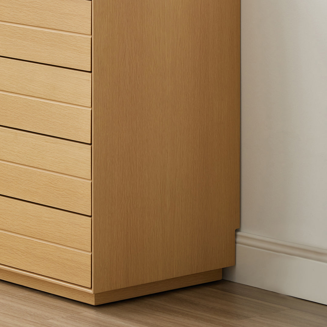 Minimalist ash wood veneer chest of 5 drawers moi in panoramic view.