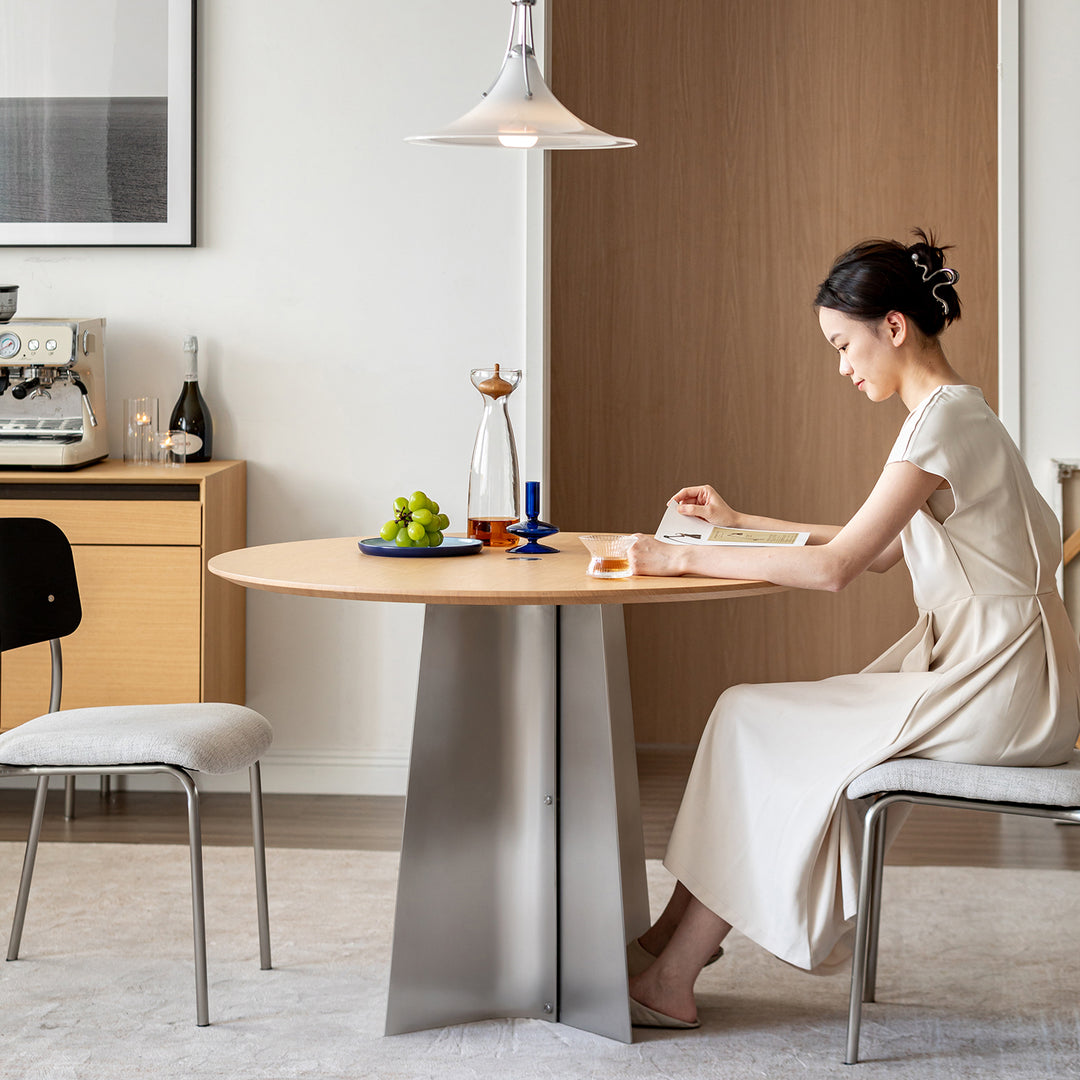 Minimalist ash wood veneer stainless steel round dining table aeri in details.