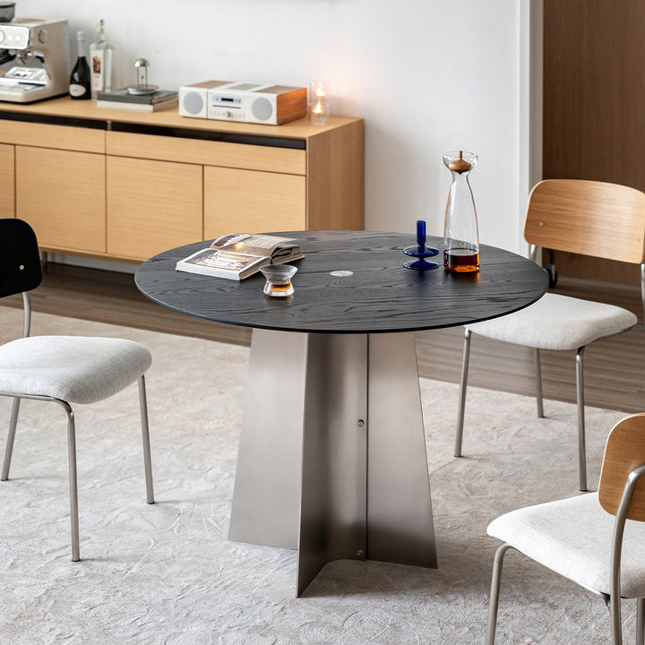 Minimalist ash wood veneer stainless steel round dining table black aeri primary product view.
