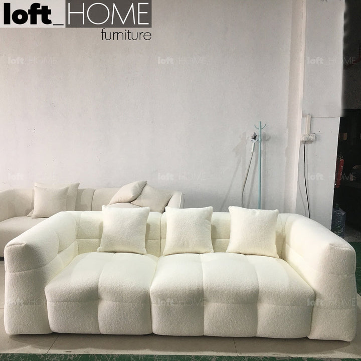 Minimalist boucle fabric 3 seater sofa boba in details.